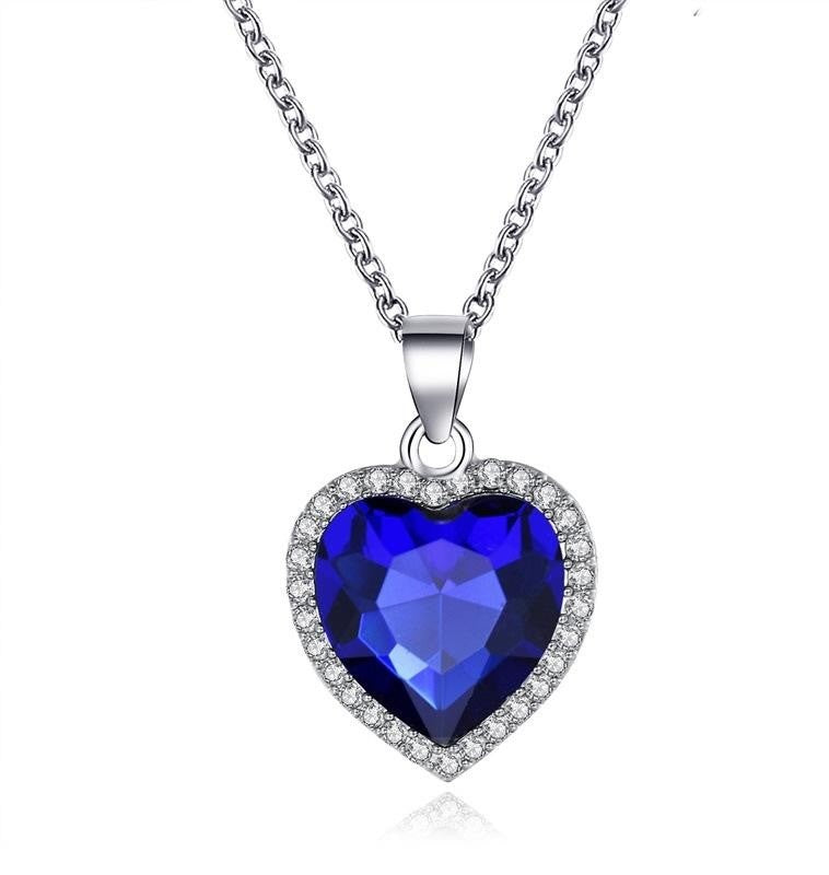 a blue and silver heart shaped pendant necklace