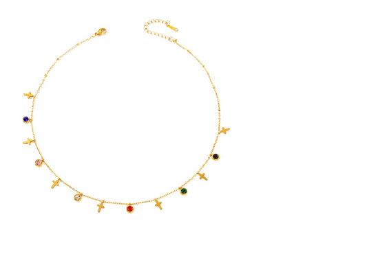 Gold necklace with colorful beads on a white background