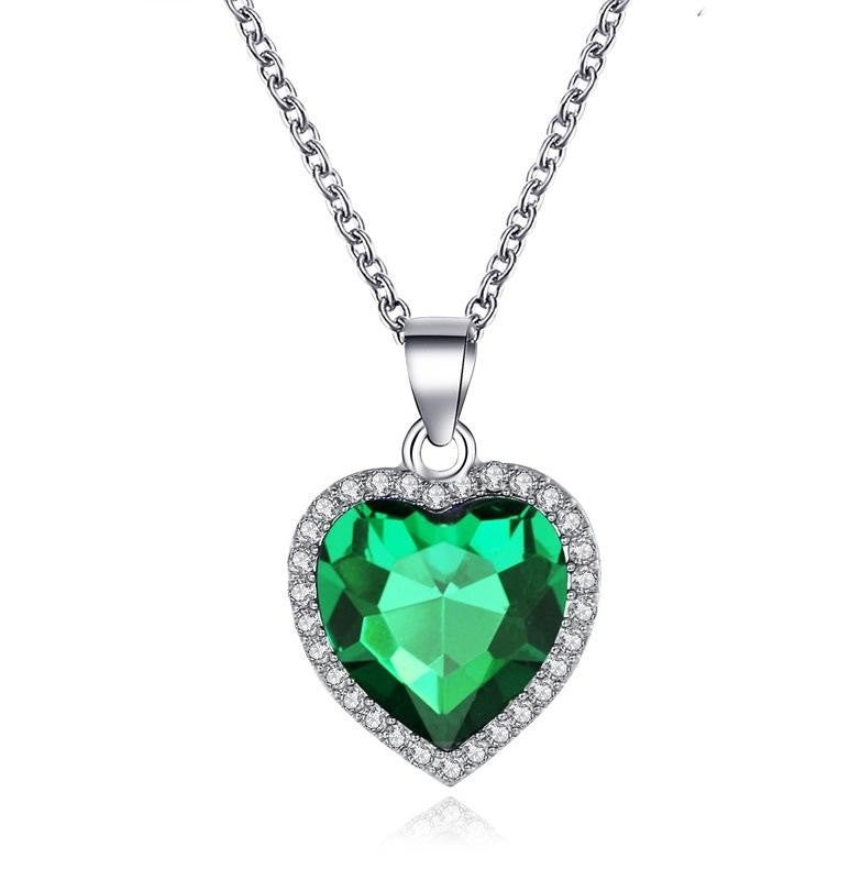 a green and silver heart shaped pendant necklace