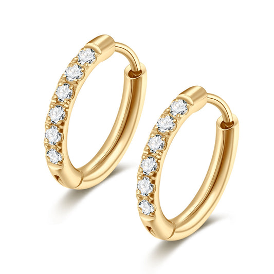 Gold hoop earrings with embedded diamonds on a white background