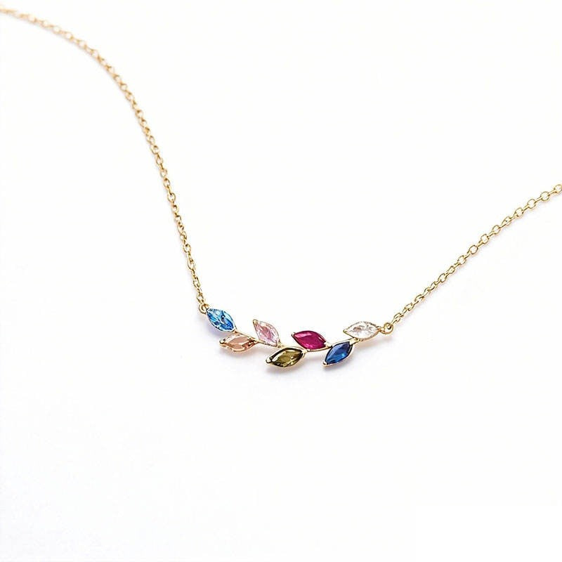 Necklace with colorful gemstones on a white background