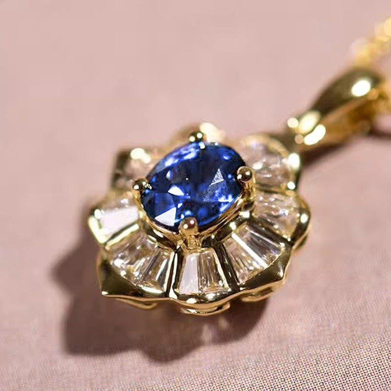 gold and blue sapphire style necklace