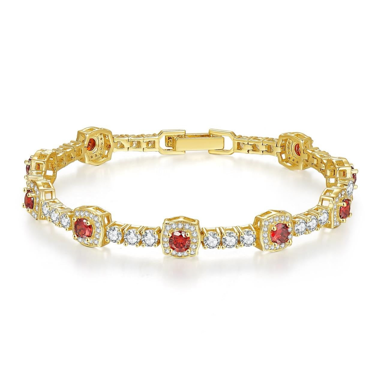 Gold bracelet with red gemstones and clear stones on a white background