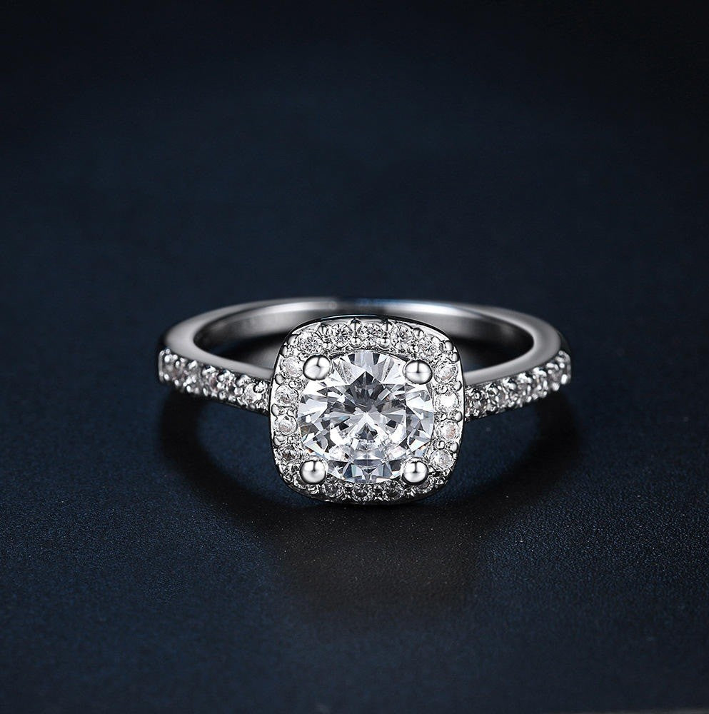 Diamond ring with a dark background